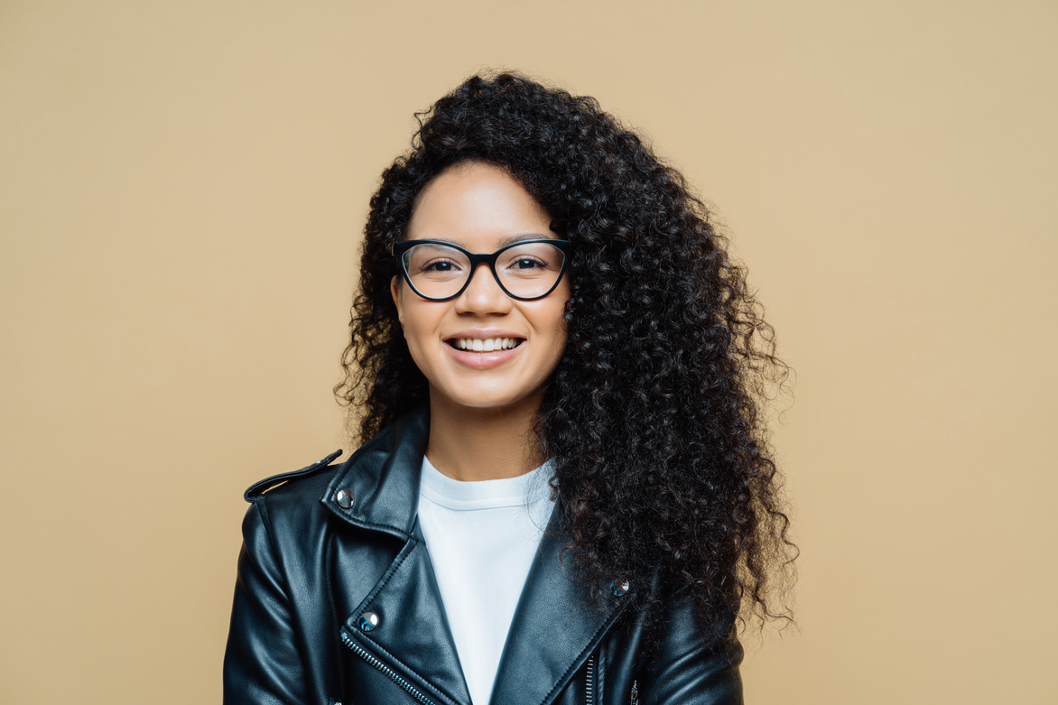 Smiling Woman Wearing Leather Jacket